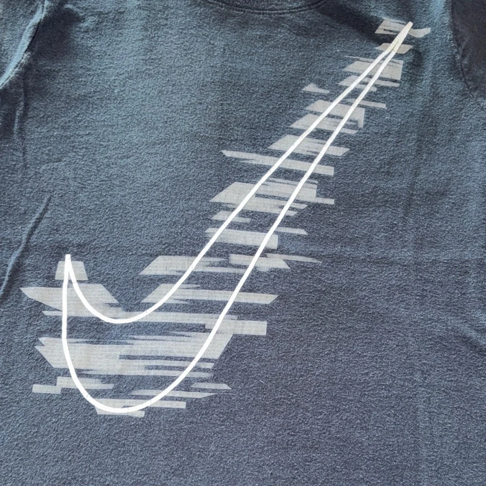 Gently loved Nike Kids Black T-Shirt with White Swoosh